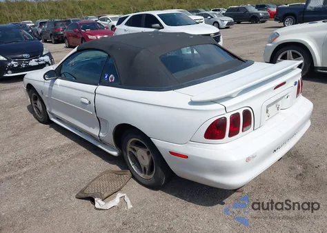 1997 Ford Mustang из США, поврежденный, VIN 1FALP4449VF180036